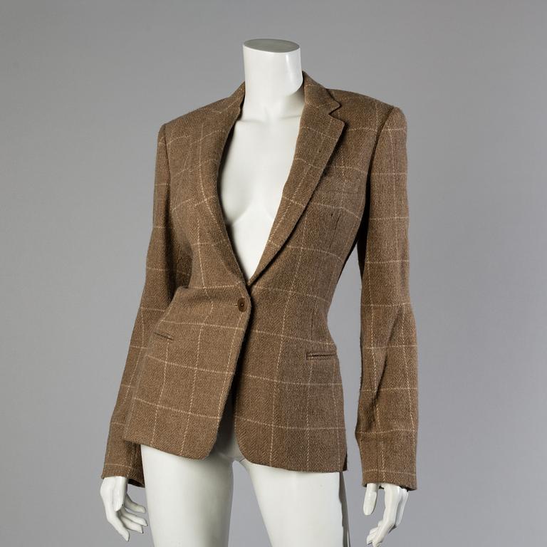 A wool/alpaca jacket by Ralph Lauren and two blouses.