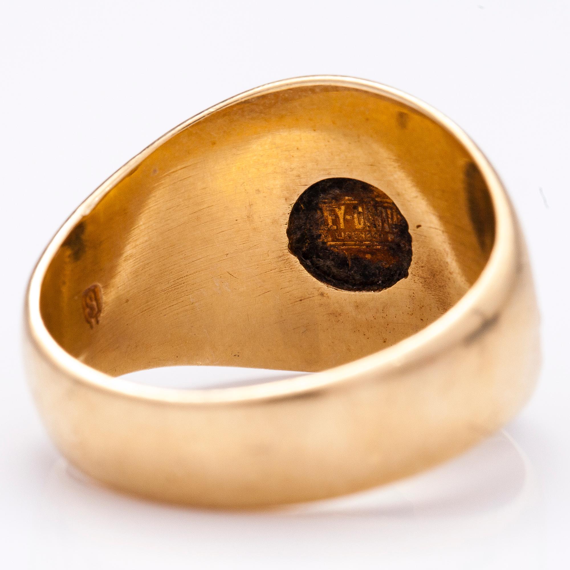 A 10K gold Harley-Davidson ring.