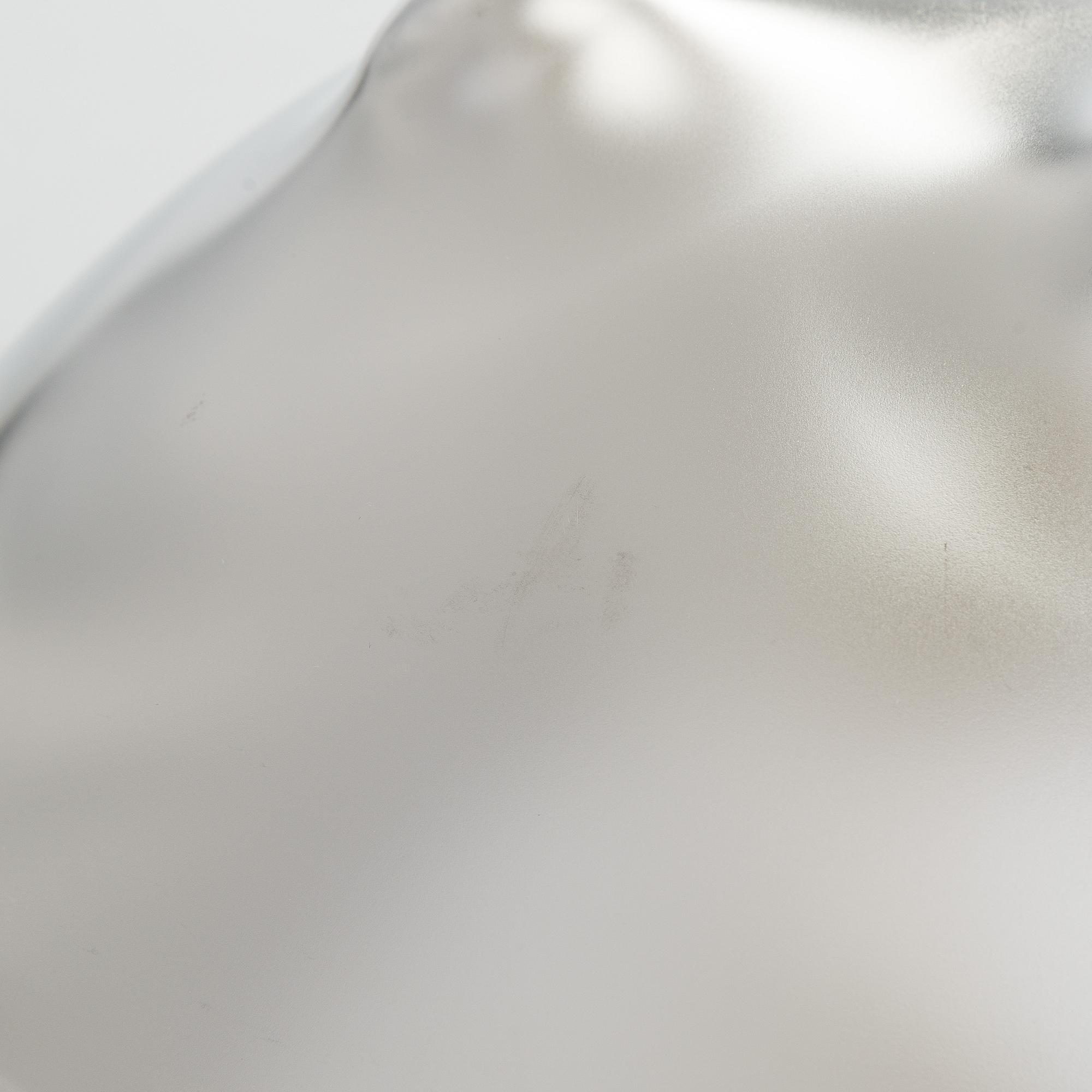 Stefan Lindfors, a stainless steel salad bowl with servers, Hackman, late 20th century.