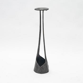 A cast iron pedestal, 20th century.