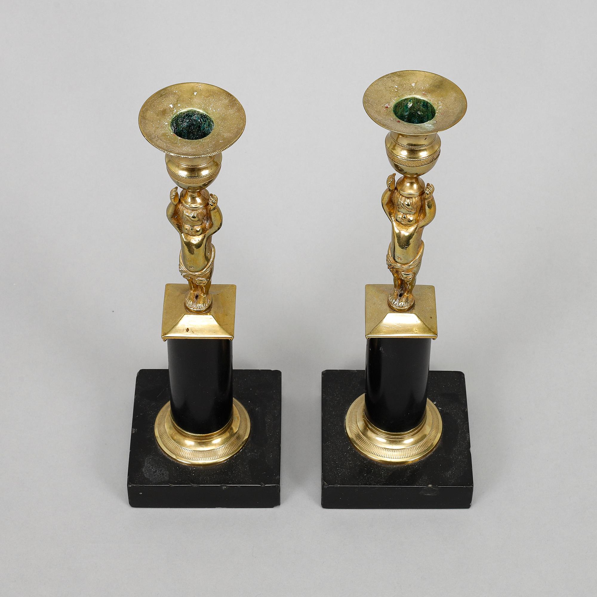 A pair of late gustavian candlesticks, circa 1800.