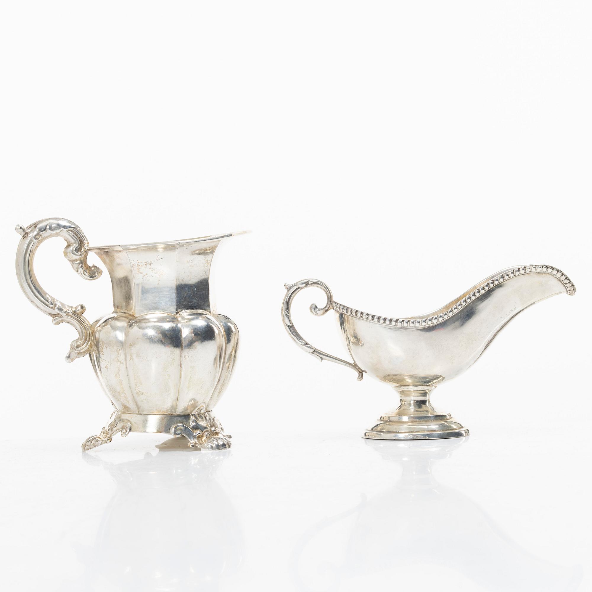 A silver gravy boat, Germany, and a silver creamer, johan Petter Tullgren, Sweden, 1857.