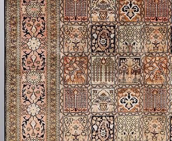 A silk Kashmir carpet, ca 313 x 212 cm.