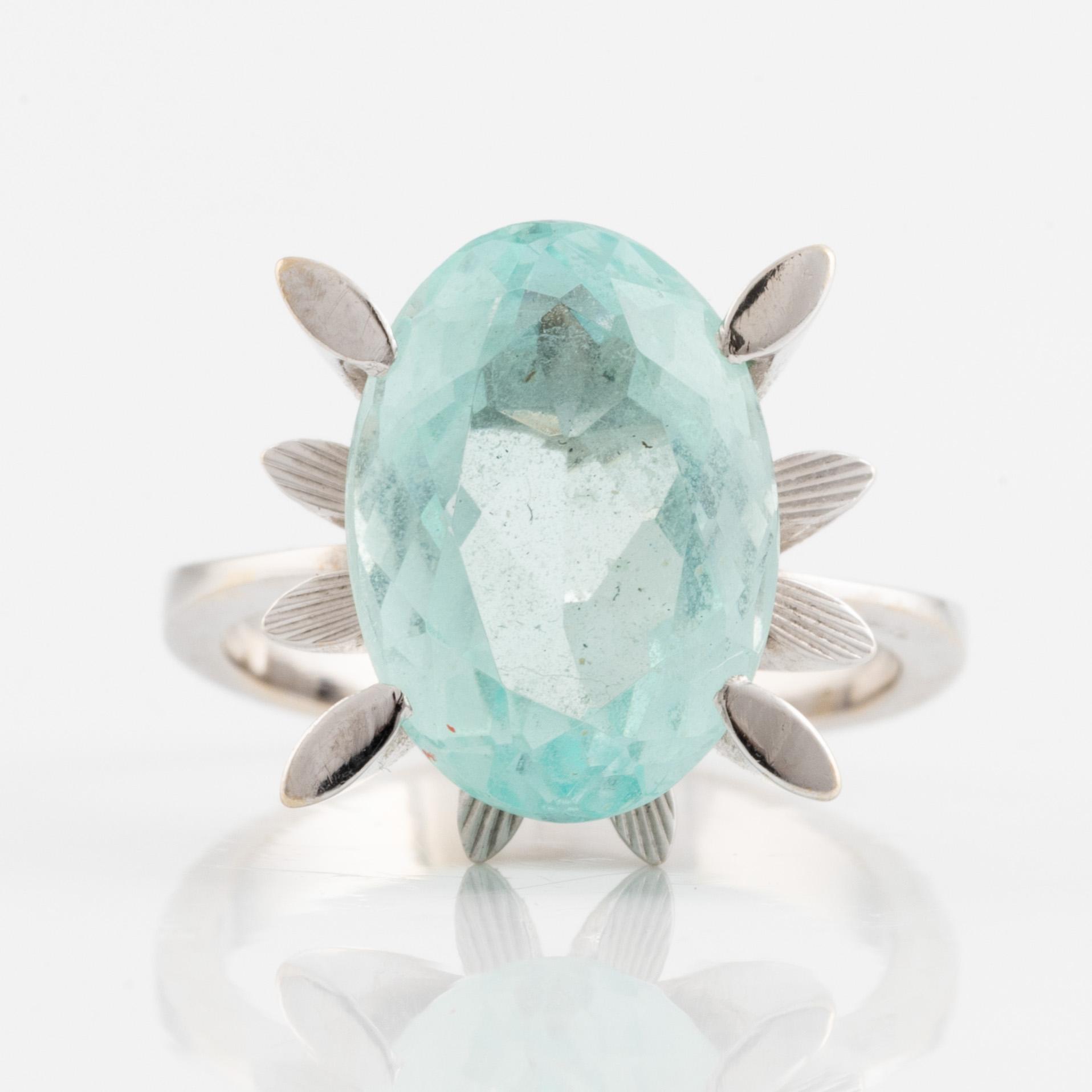 White gold and aquamarine ring.
