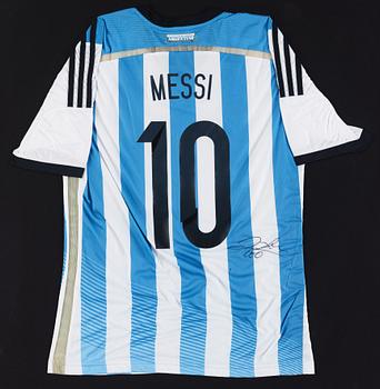 A football shirt, signed by Lionel Messi.