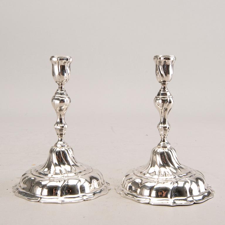 A pair of German silver candle sticks around 1900 total weight 374 gr.