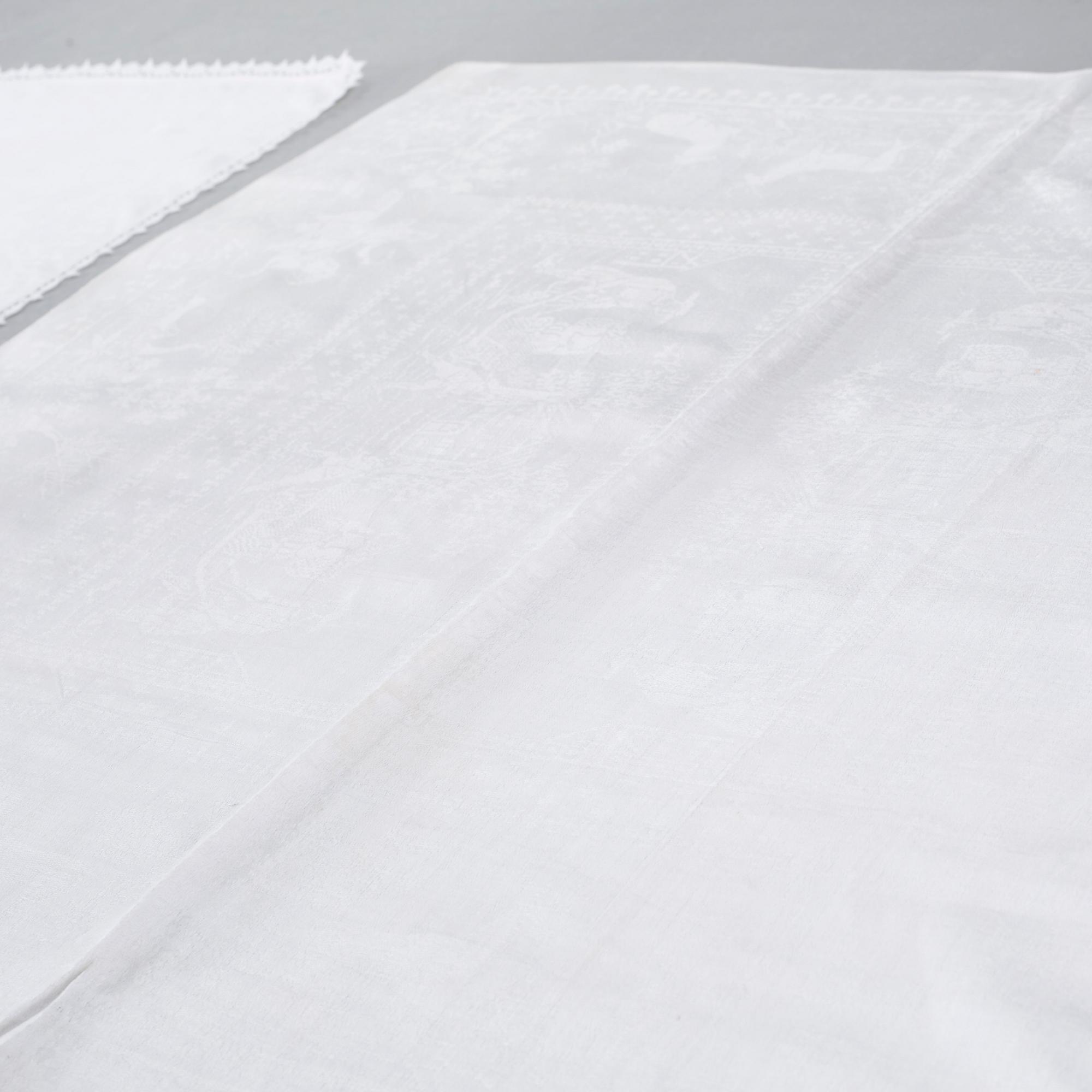 Three 19th century damask napkins.