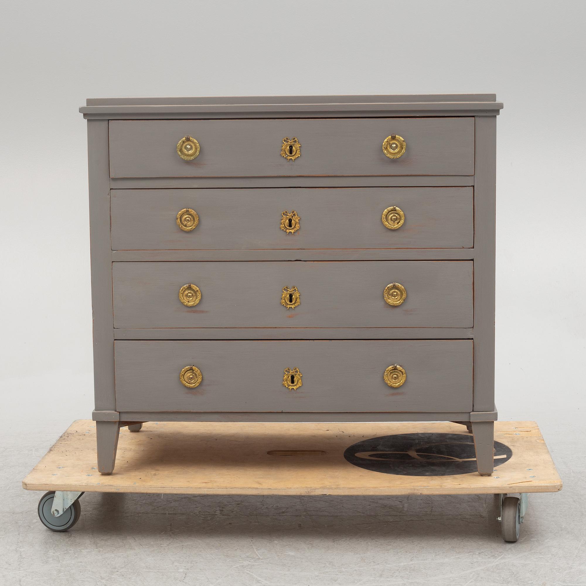 A Gustavian style chest of drawers, early 20th century.