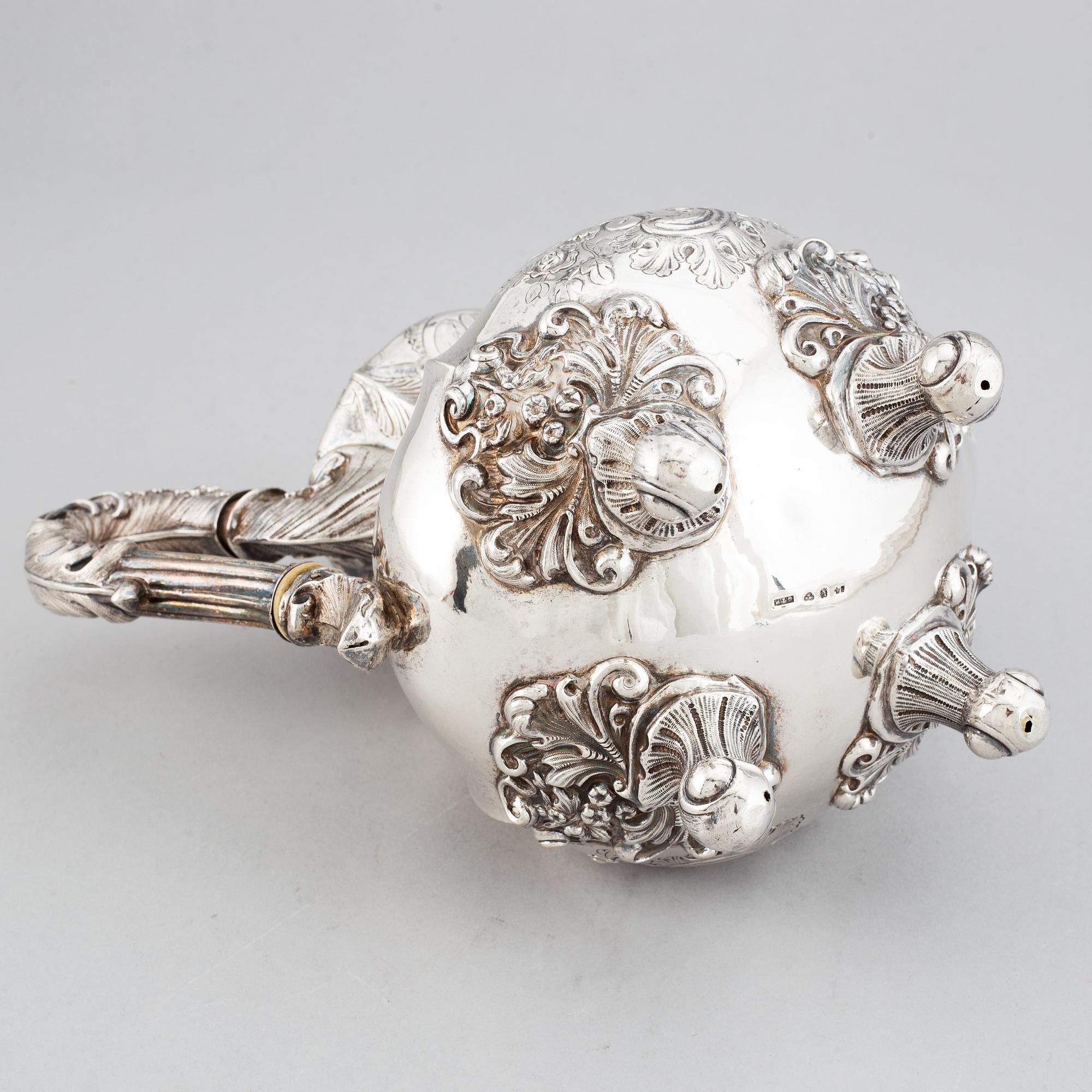 A Swedish rokoko-style silver coffee-pot, mark of Gustaf Theodor Folcker, Stockholm 1848.