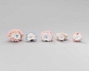 A set of five Dresden porcelain figurines in lace dresses. Mid-20th century.
