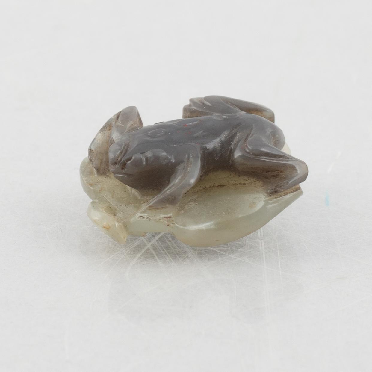 A group of three Chinese stone charms, 20th century.