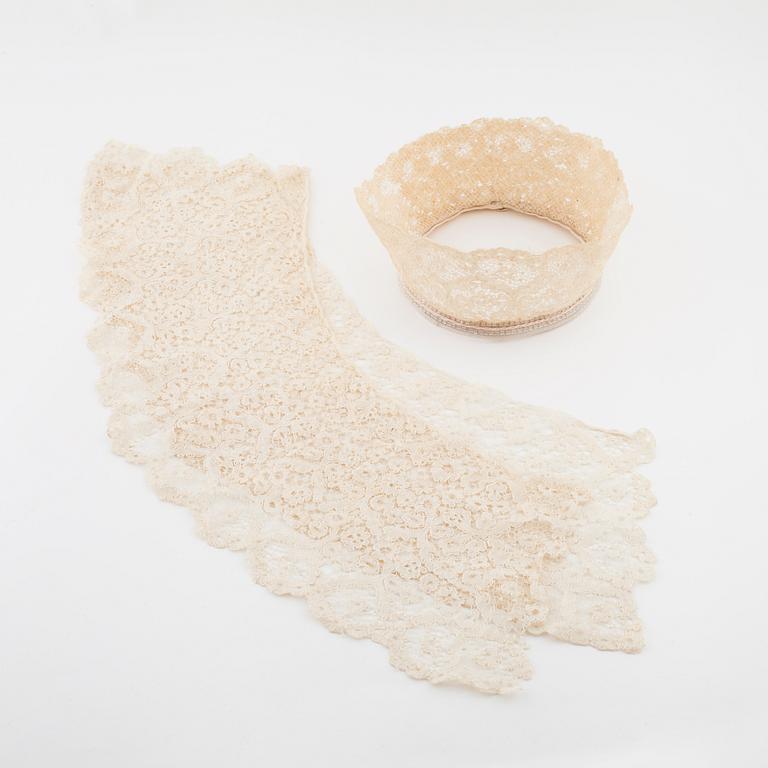 A bridal crown, two lace collar and two pair of gloves.