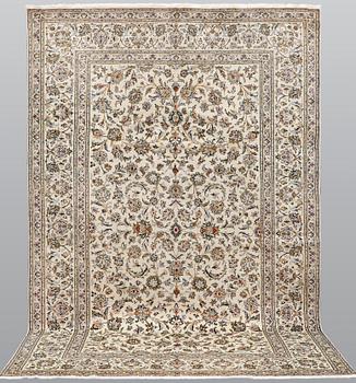 A Keshan carpet, approx. 314 x 199 cm.