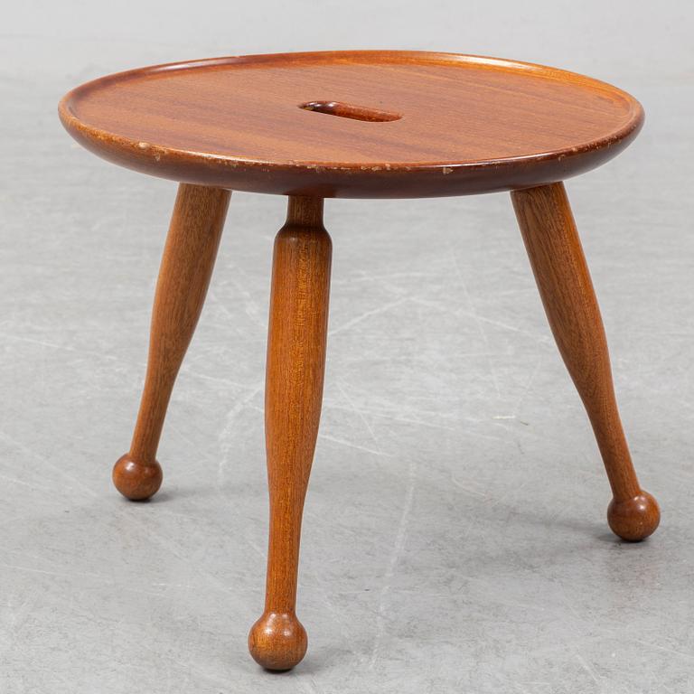 A mahogny stool, model 2156, by Josef Frank for Firma Svenskt Tenn.