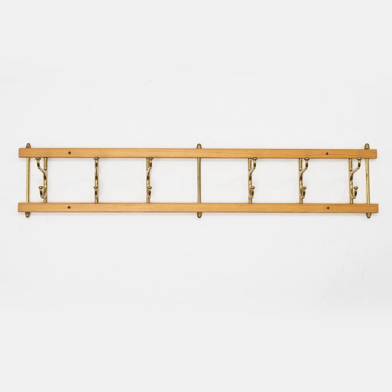 Klädhängare,  "Dekorativ", Skogslunds Metallgjuteri, Anderstorp, 1950/60-tal.