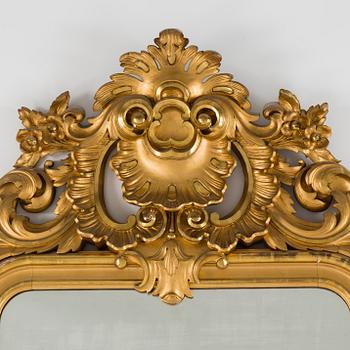 A gilt wood mirror and marble top console table, early 20th Century.