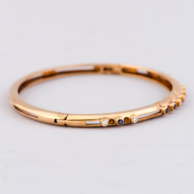 ARMRING, safirer, diamanter, 14K guld. Sovietunionen.