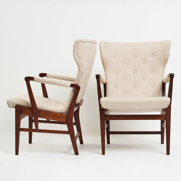 Bertil Söderberg, a pair of mahogany Swedish Modern easy chairs, Nordiska Kompaniet, 1940's.