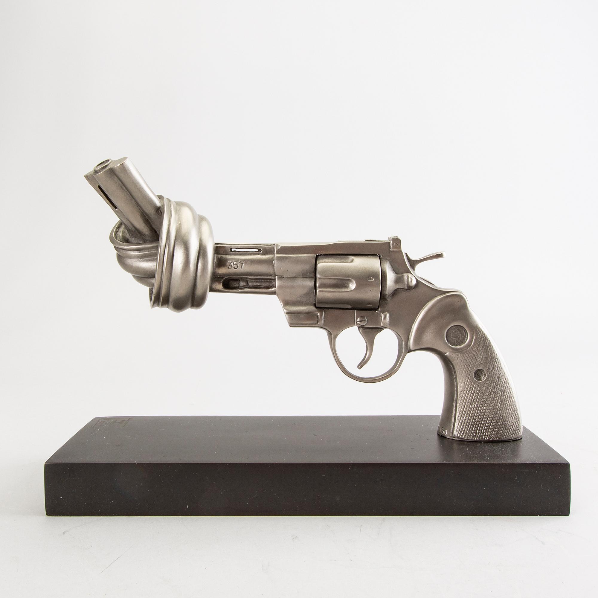 Carl-Fredrik Reuterswärd/ The Non-Violence Project Foundation, a signed and numbered sculpture 55/150 in humanium metal.