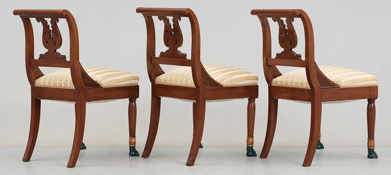 A set of five Empire 19th century chairs.