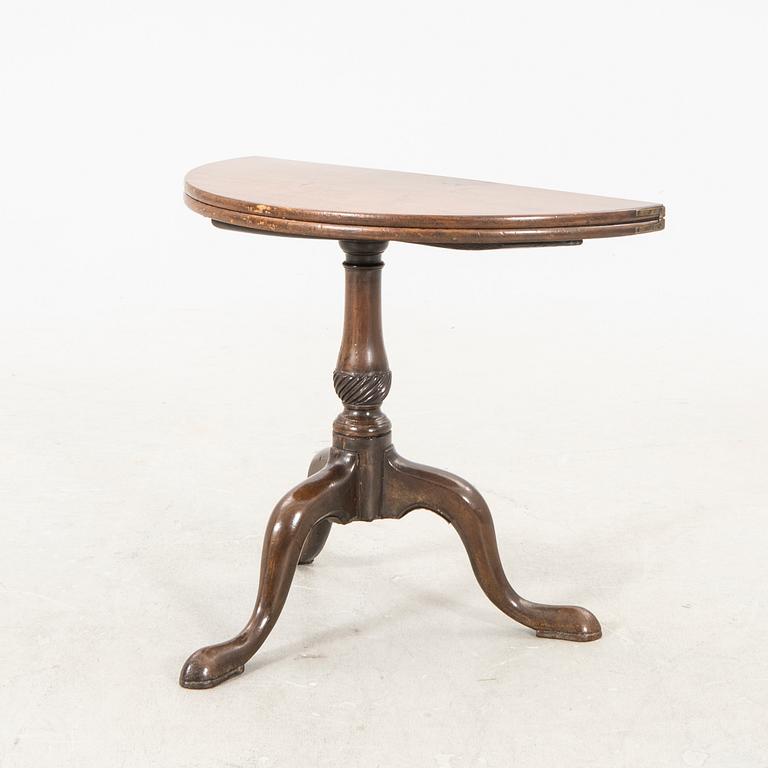 An English Queen Anne mahogany folding table 18th century.