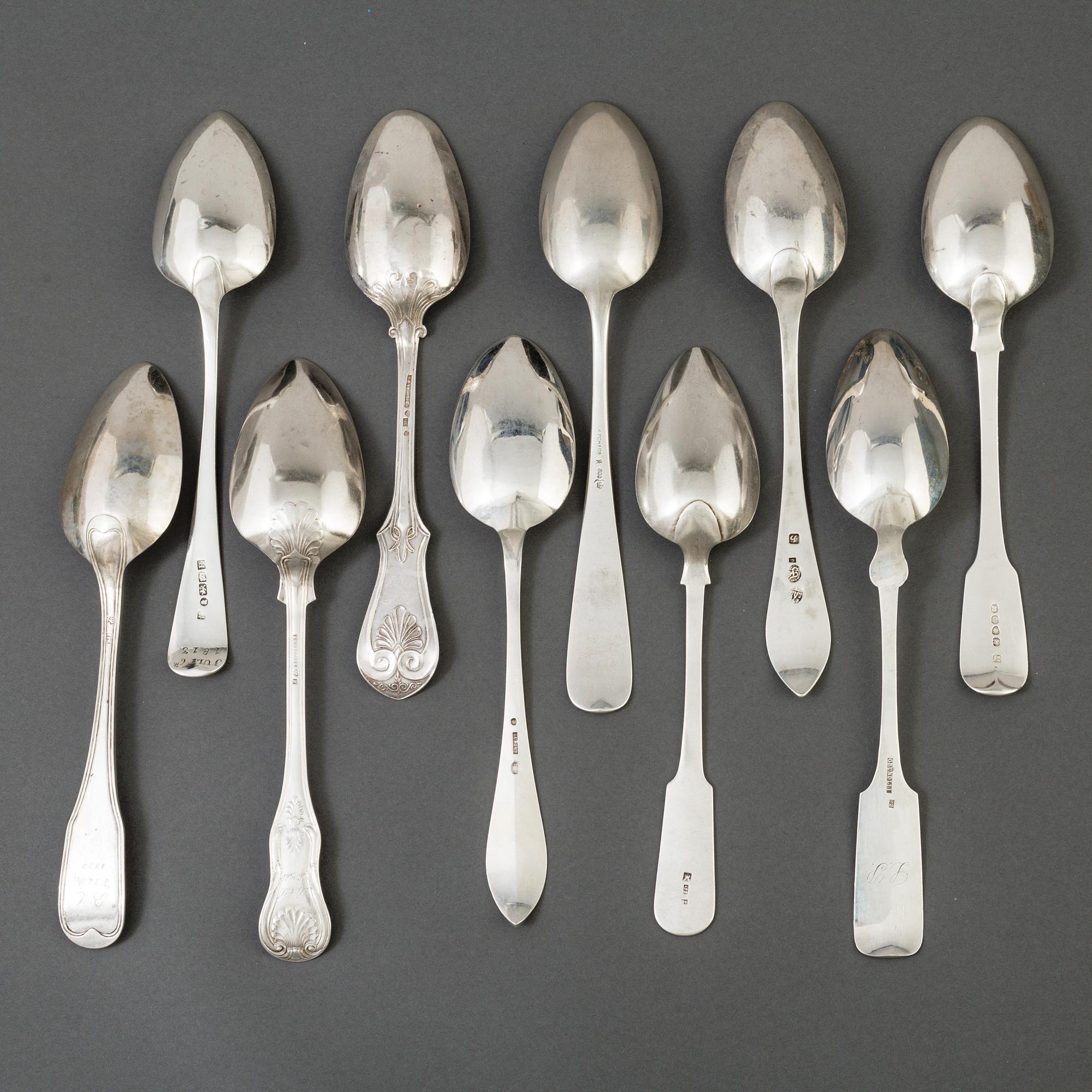 A set of 10 different spoons of different nationalities.