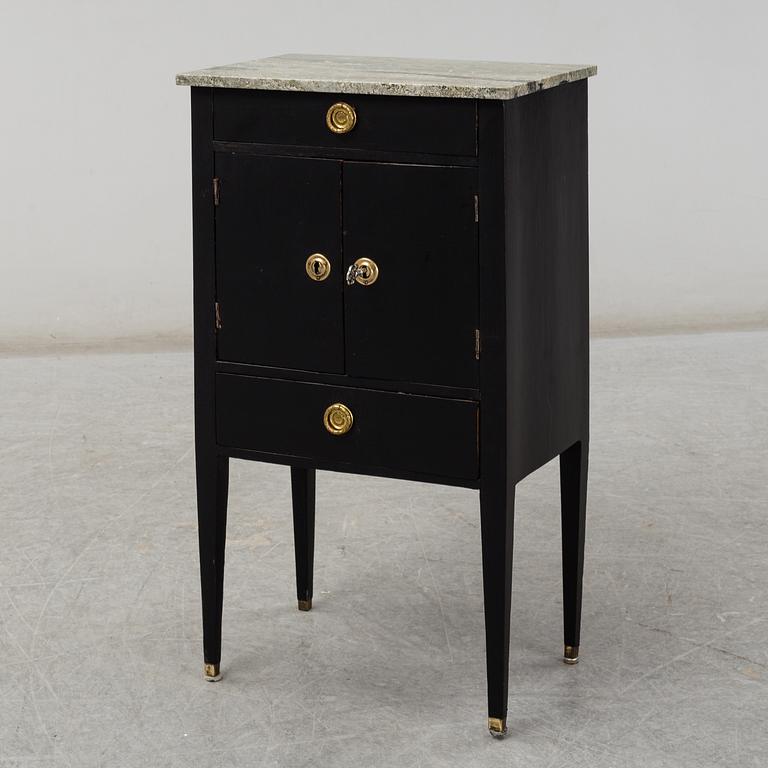 A 19th century gustavian style bedside table.