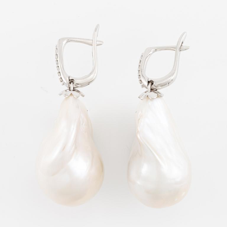 Earrings, a pair, 18K white gold with baroque cultured freshwater pearls and brilliant-cut diamonds.