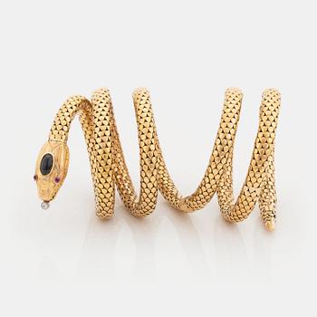 517. An 18K gold snake bracelet.