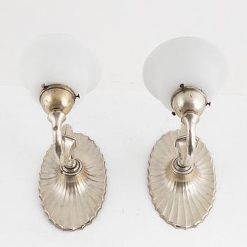 A pair of silver-plate wall lamps, C.G. Hallberg, 1920's.