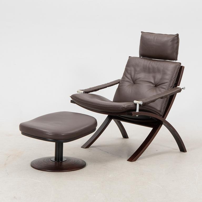 Åke Fribyter, an armchair and fotstool by Nelo, Knislinge, second half of the 20th Century.