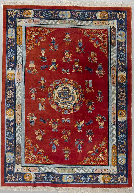 A carpet, semi-antique/old Kina, ca 295,5 x 212 cm.