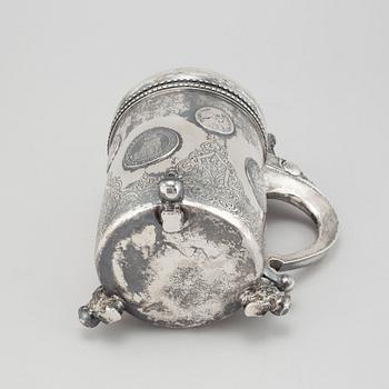 A parcel-gilt silver baroque style tankard.
