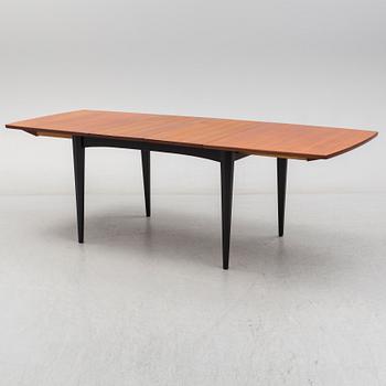 A 1950s/1960s teak and teak veneer table.