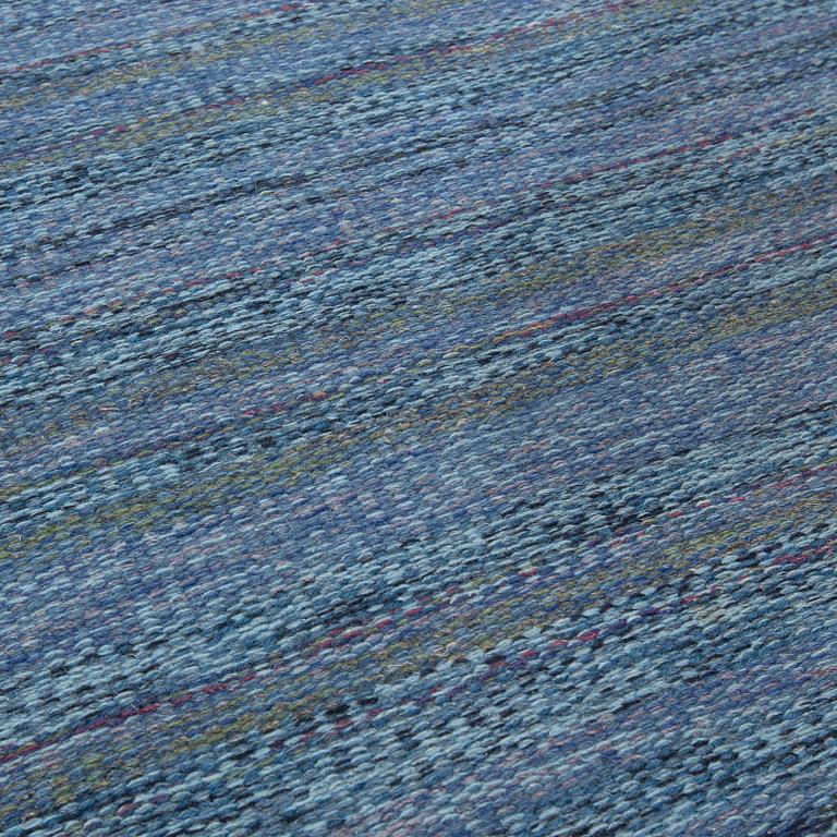 A CARPET, flat weave, atributed to Rakel Carlander, around 306 x 197 cm.