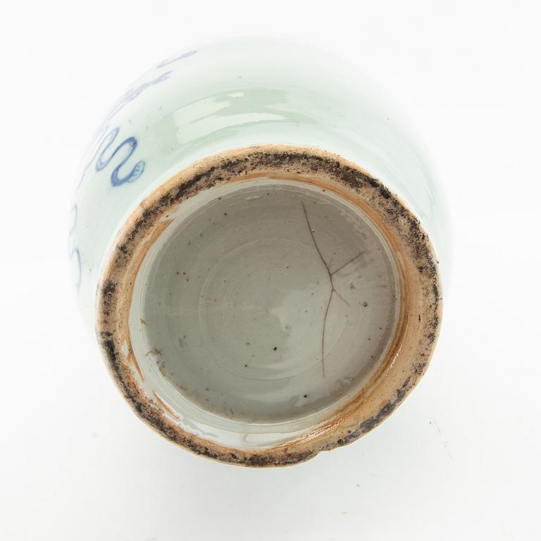 A celadon ground blue and white vase, 20th century.