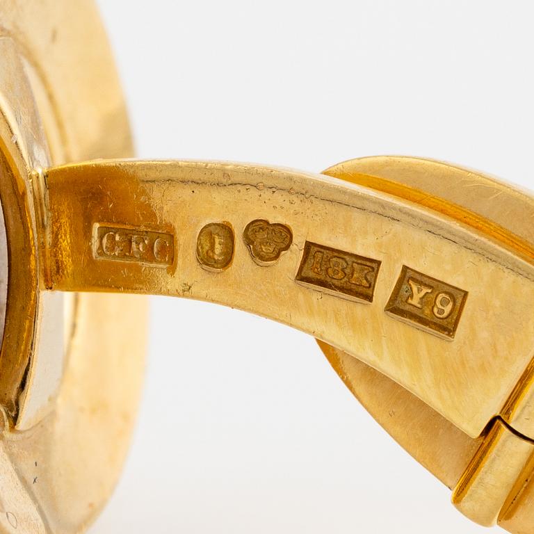 CF Carlman, ett par manschettknappar 18K guld med opalmatrix.