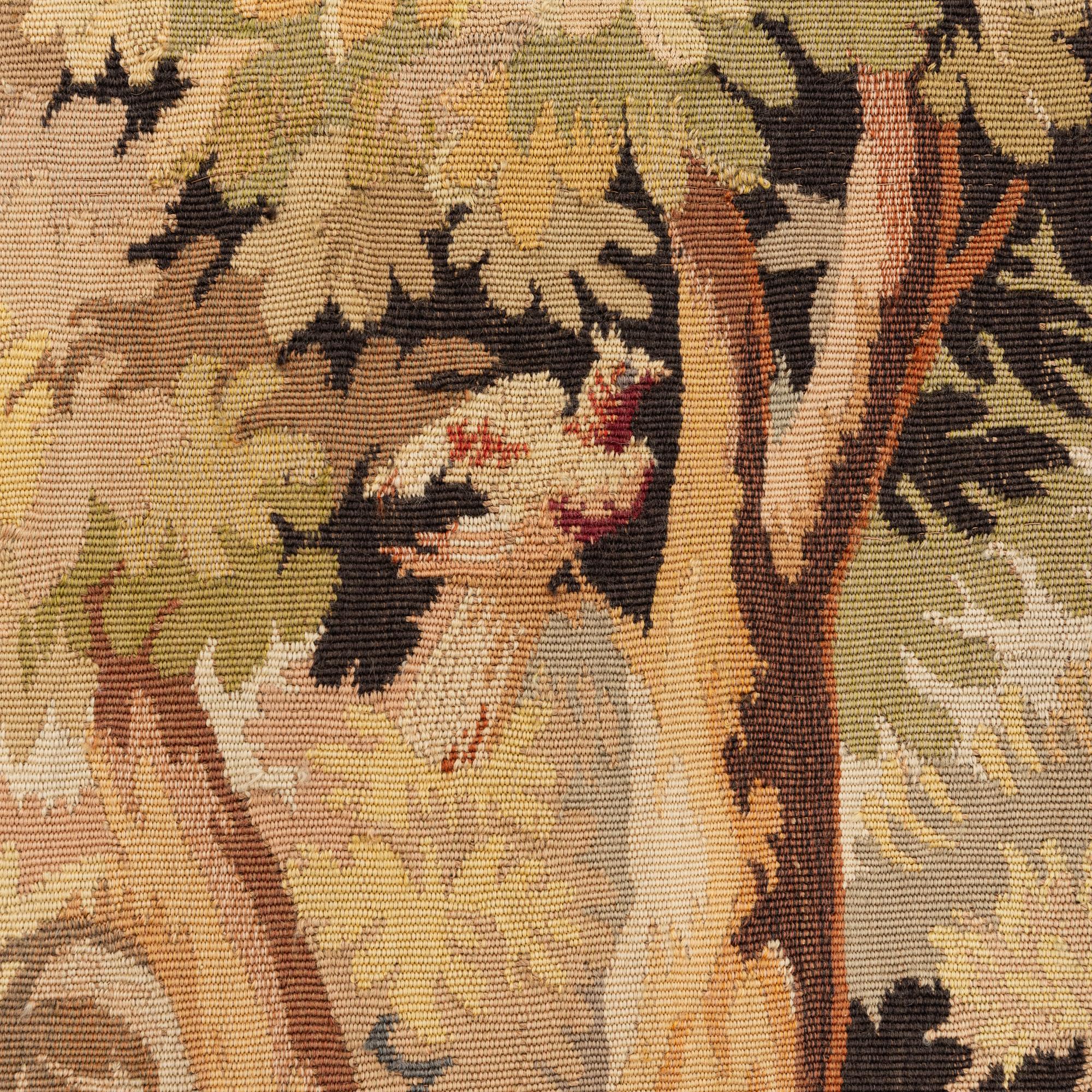 A European 'verdur' tapestry, c. 297 x 290 cm, 17th century.
