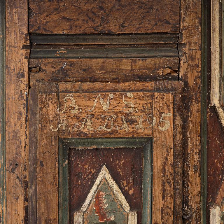 Hörnskåp, allmoge, västsvenskt, daterat 1795.