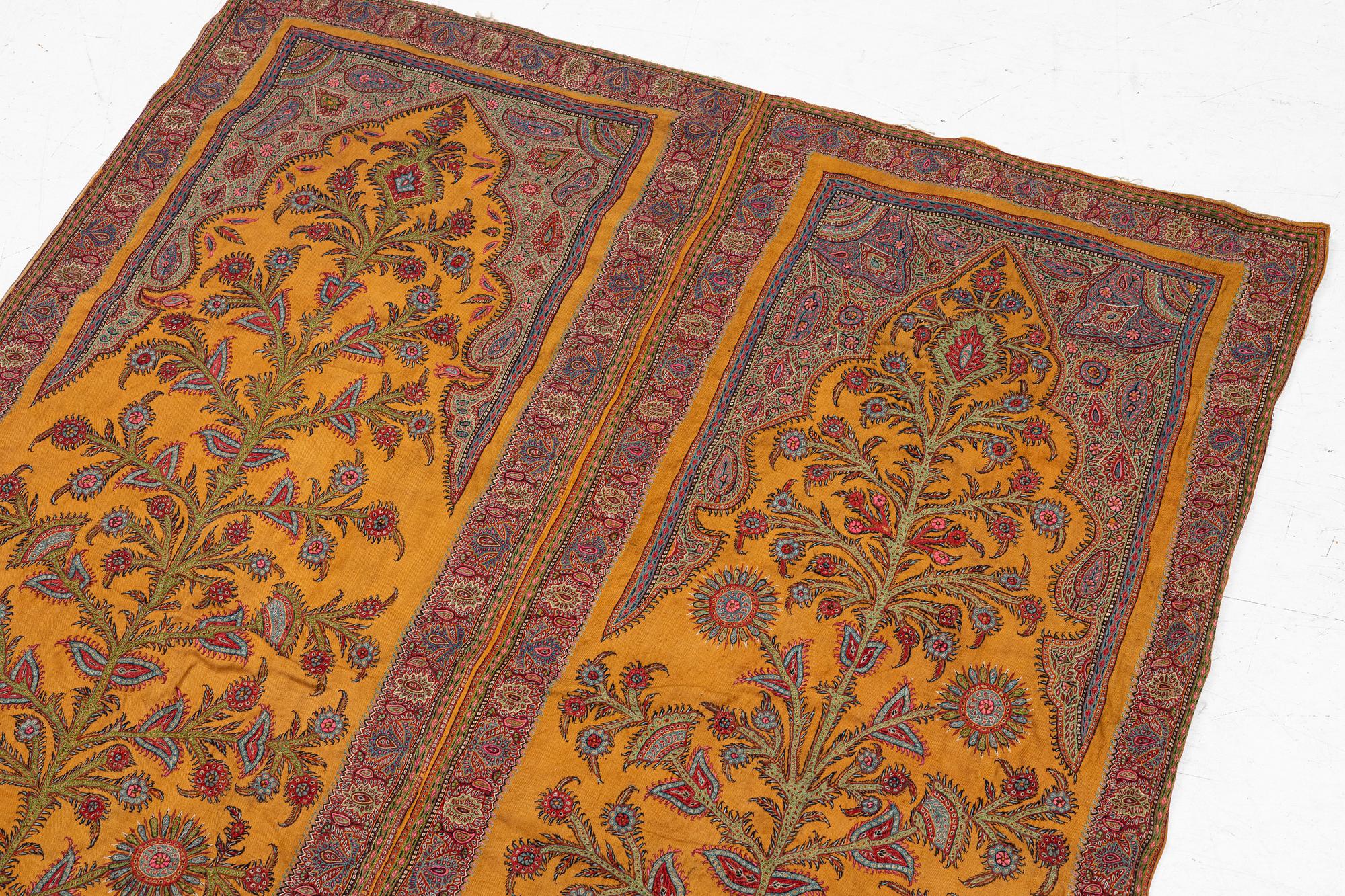 Embroidery, a pair, semi-antique Pateh Kirman, approx. 122 x 190 cm in total.