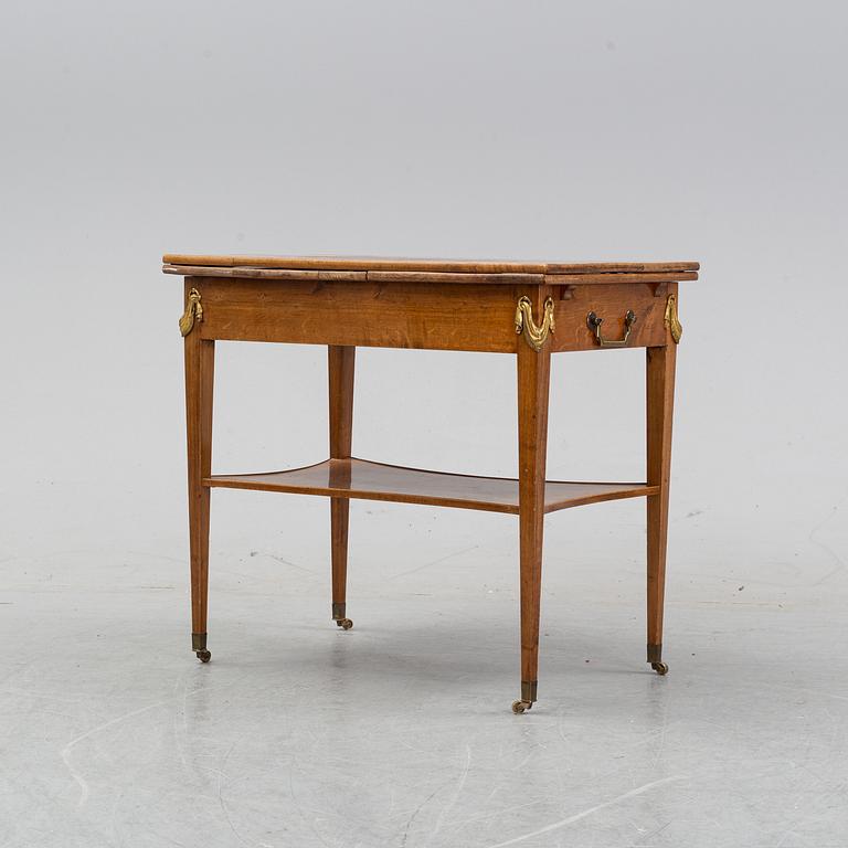 Sidobord med rotfaner, Sverige, 1900-talets första hälft.