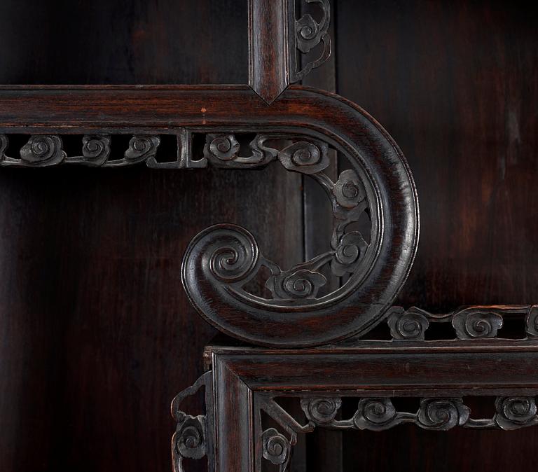 A Chinese hardwood cabinet, early 20th Century.