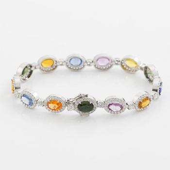 Bracelet 18K white gold set with oval-cut multicoloured sapphires and brilliant-cut diamonds.