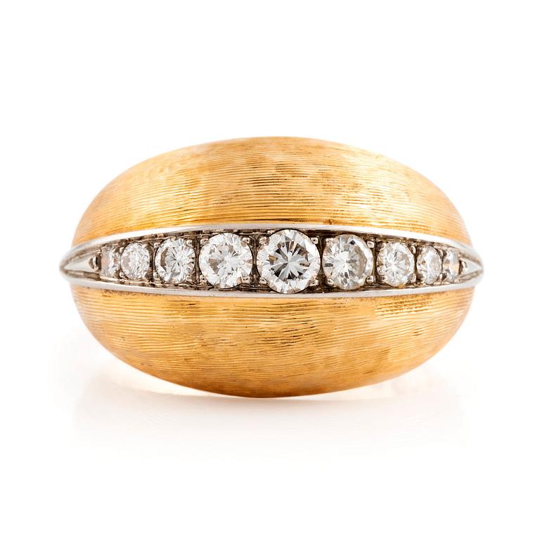 An 18K gold ring set with round brilliant-cut diamonds by CF Carlman.
