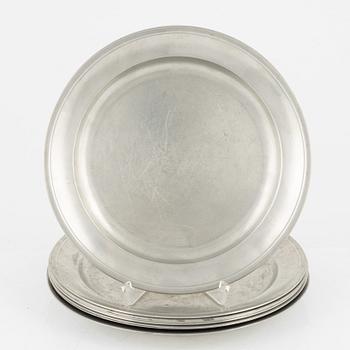 A set of eight pewter side plates, Firma Svenskt Tenn, Stockholm, 1927 and 1944.