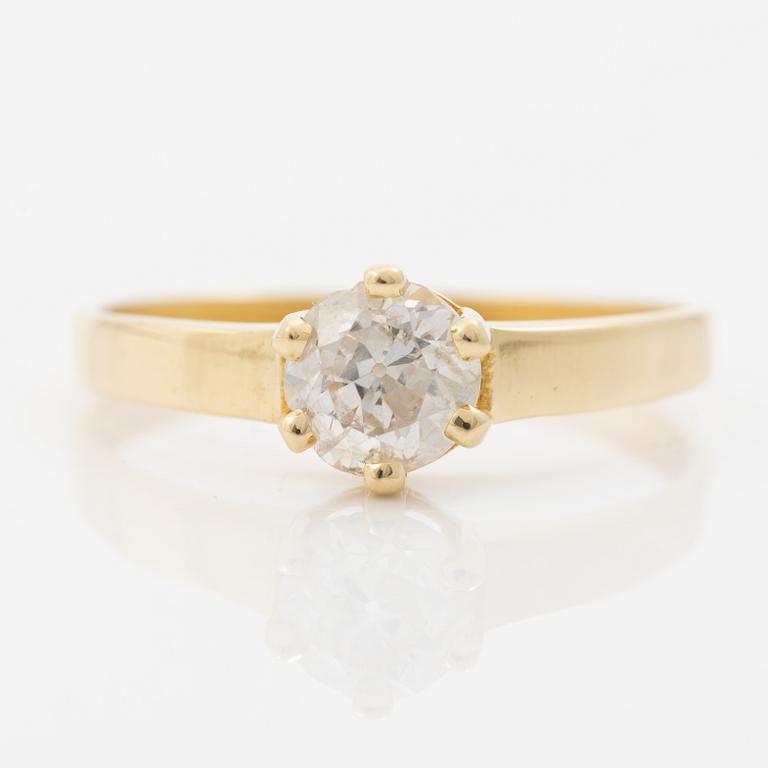 18K gold ring with an old-cut diamond.