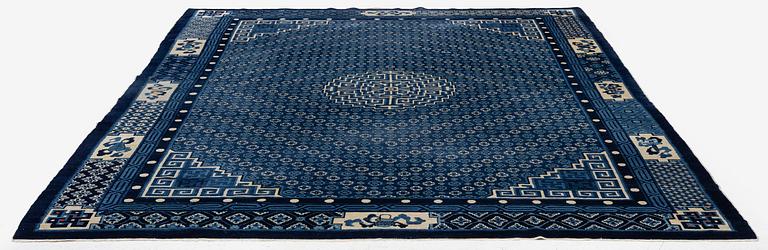 A semi-antique Baotou carpet, West China, c. 335 x 246 cm.