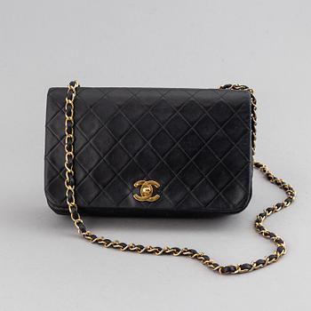 Chanel, a quilted leather 'Flap' bag, 1989-91.