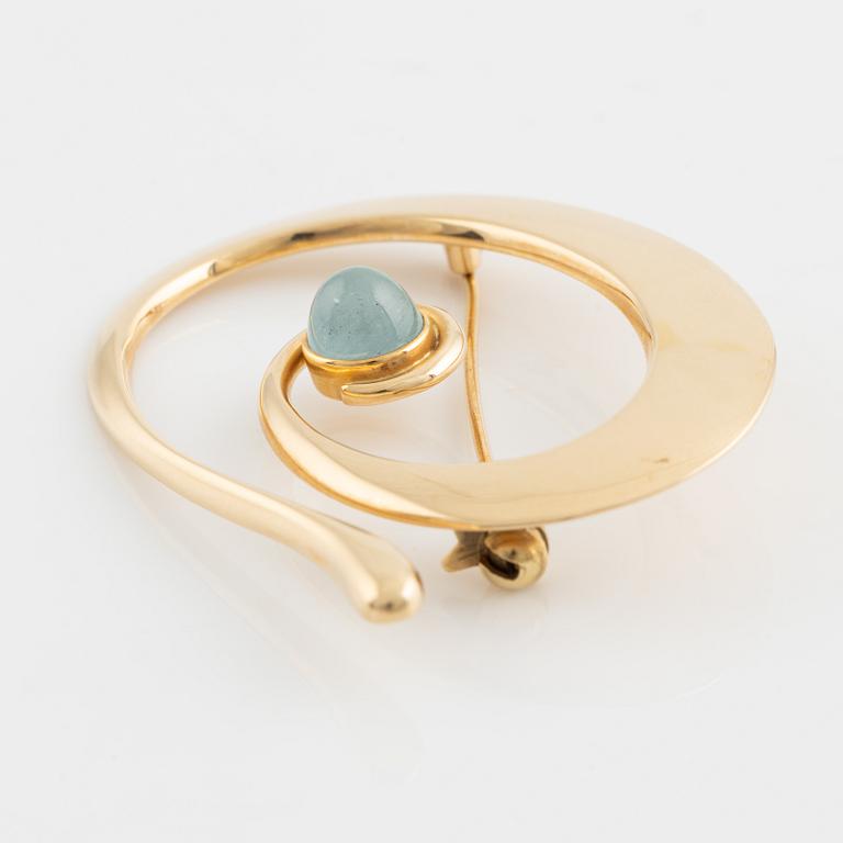 Bent Gabrielsen, 14K gold, with cabochon cut blue stone brooch, Denmark.