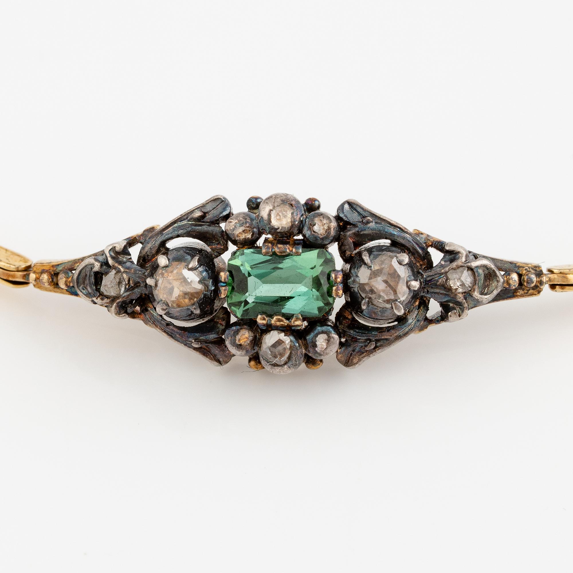 Armband 18K guld och silver med grön turmalin och rosenslipade diamanter.